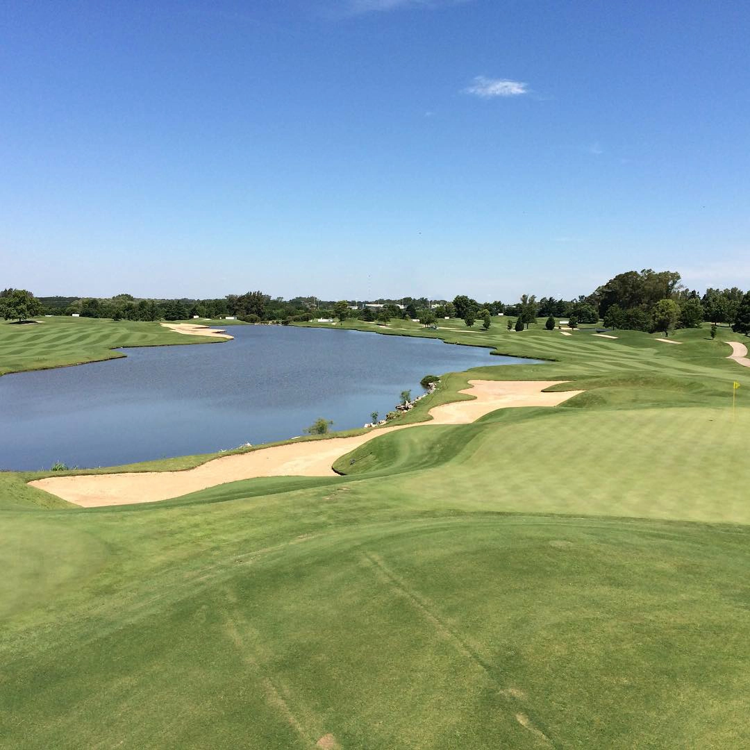 Golfer teeing off at Pilar Golf Club Argentina