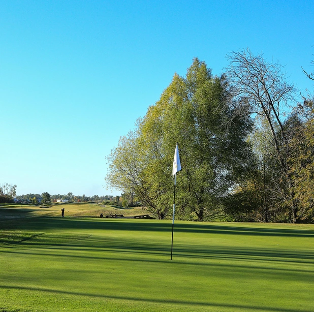 Contoured fairway and green at Pilará Golf Club Argentina